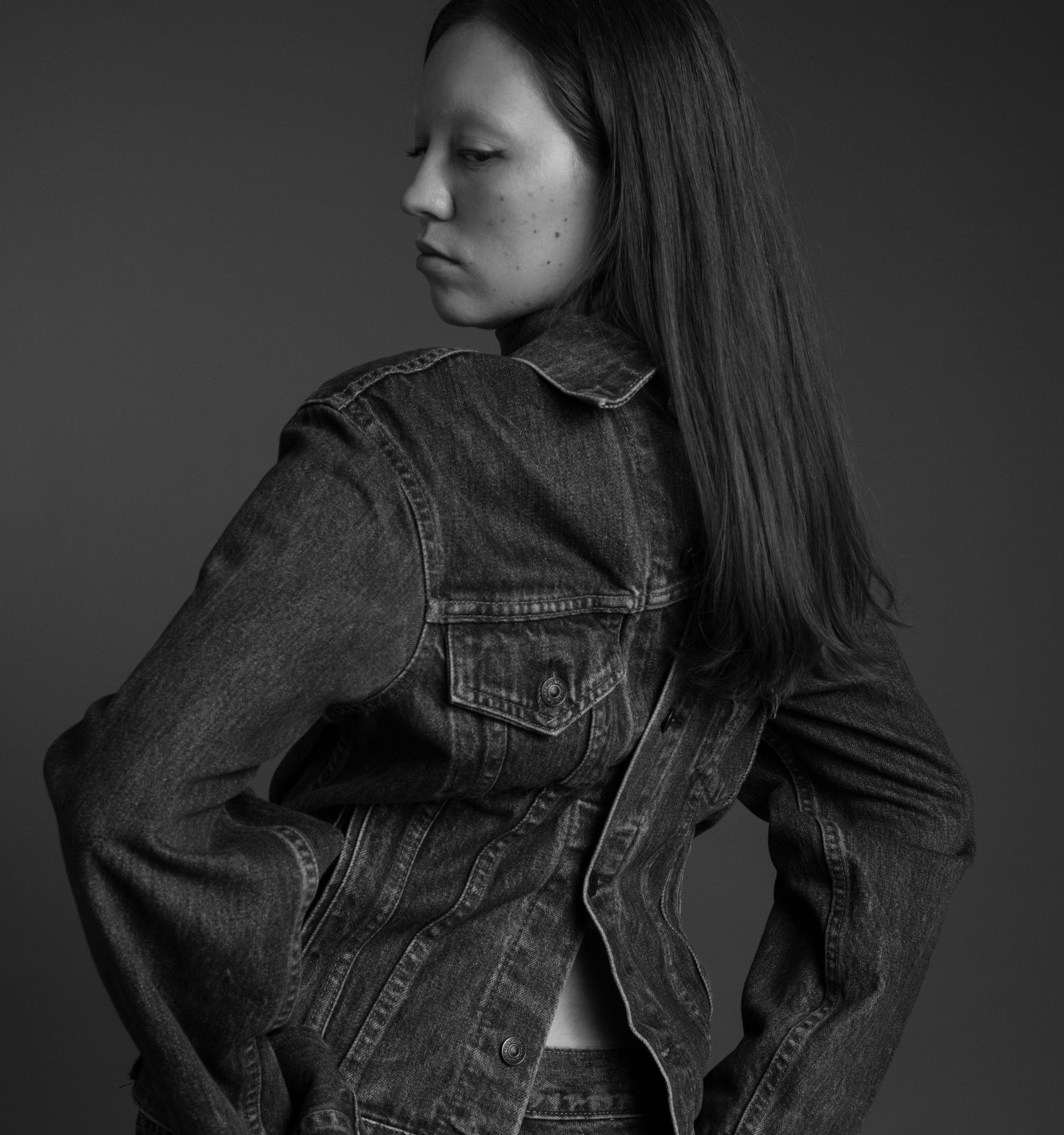 Beacasso's studio portrait of a woman in denim on the Fujifilm X-T50